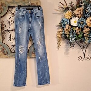 Distressed & Ripped Light Blue Jeans. NWOT Size 27